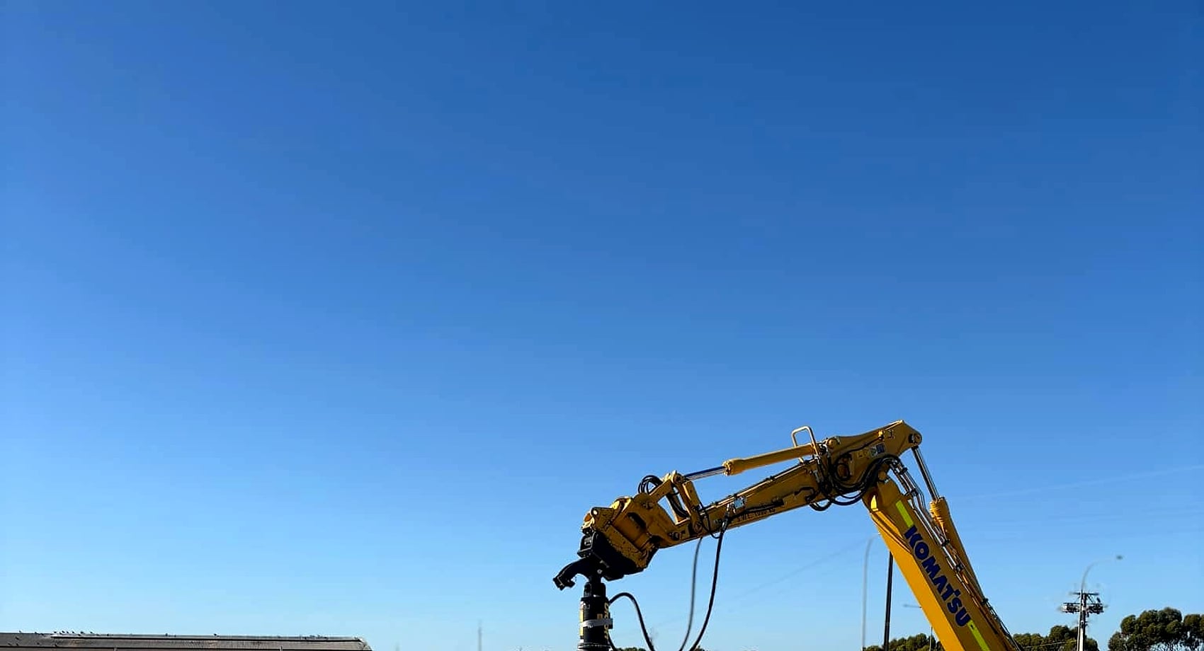 Lucas Industries excavator working on a civil infrastructure site in Adelaide